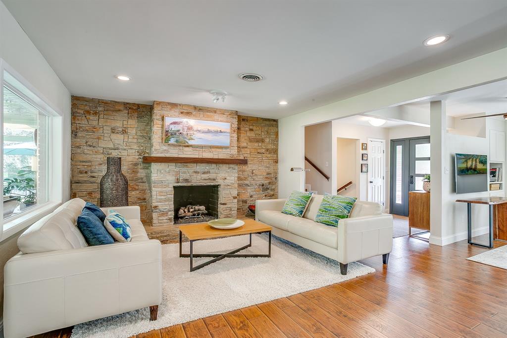 1816 Granada Road Fort Worth, TX 76116 - Photo 7 of 40 a living room with furniture and a fireplace