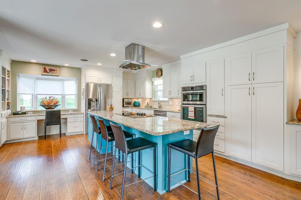 1816 Granada Road Fort Worth, TX 76116 - Photo 9 of 40 a view of a dining room with furniture and wooden floor