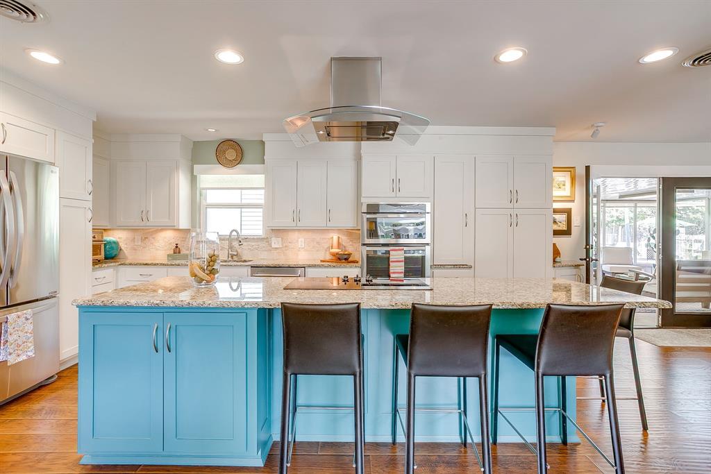 1816 Granada Road Fort Worth, TX 76116 - Photo 10 of 40 a kitchen with stainless steel appliances granite countertop a sink and cabinets