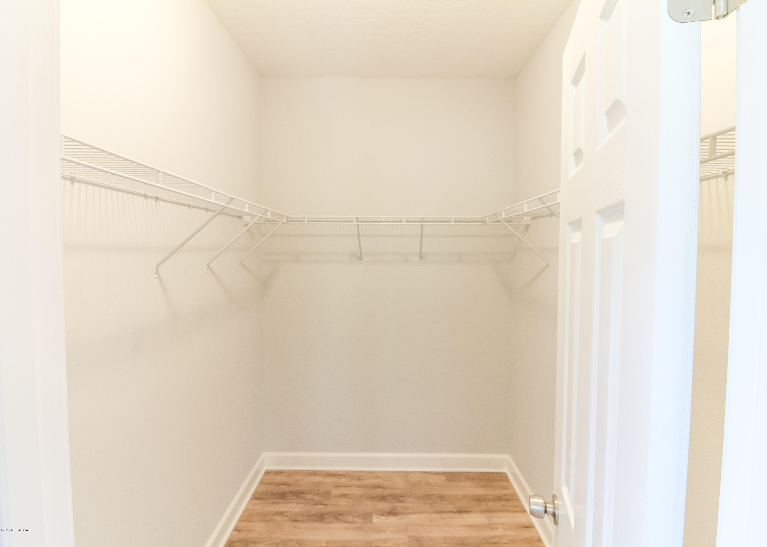 109 Jasmine Road St. Augustine, FL 32086 - Photo 12 of 36 a view of a room with racks on the wall