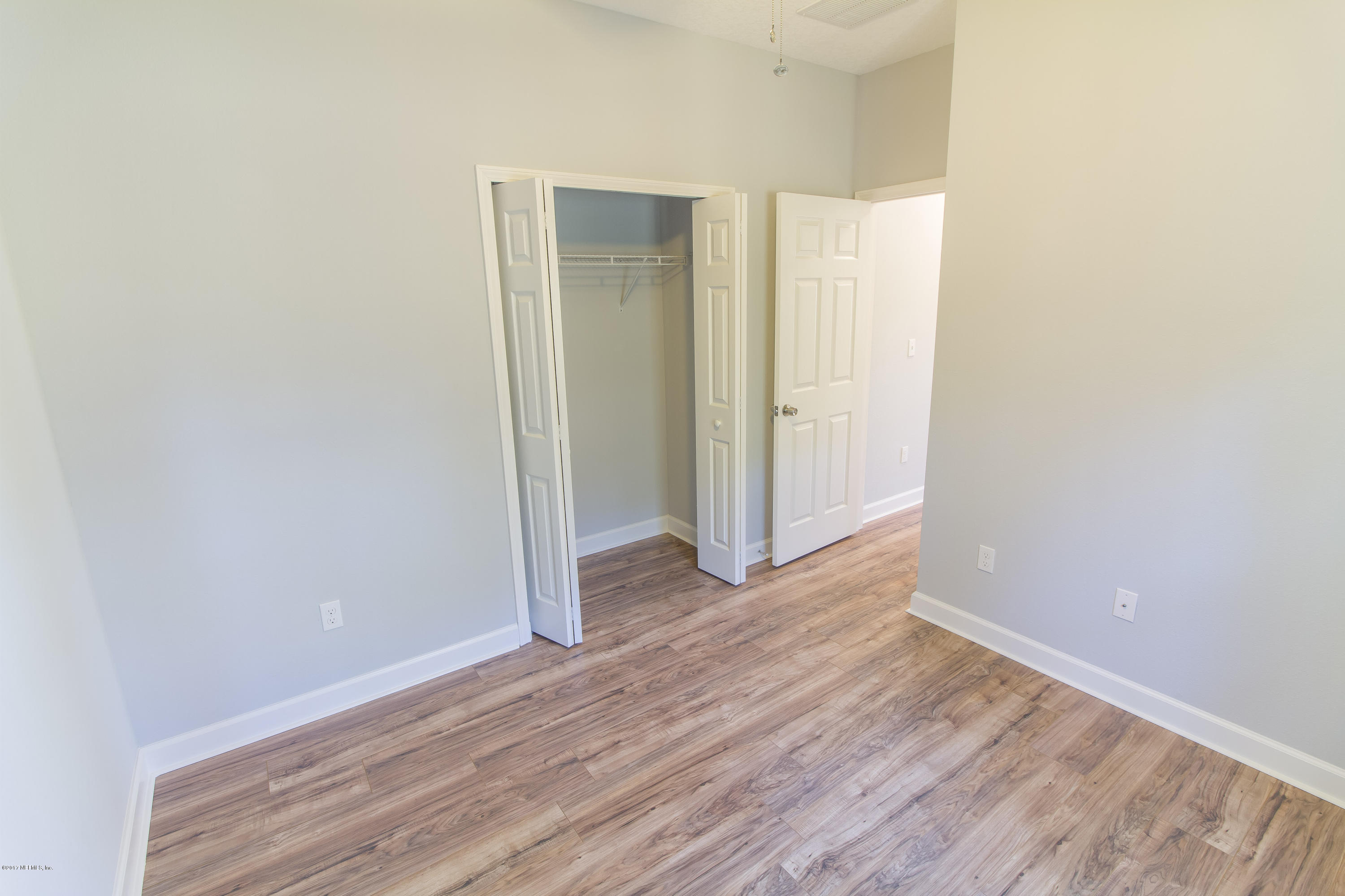 109 Jasmine Road St. Augustine, FL 32086 - Photo 26 of 36 a view of a room with wooden floor