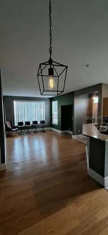 a view of room with hardwood floor