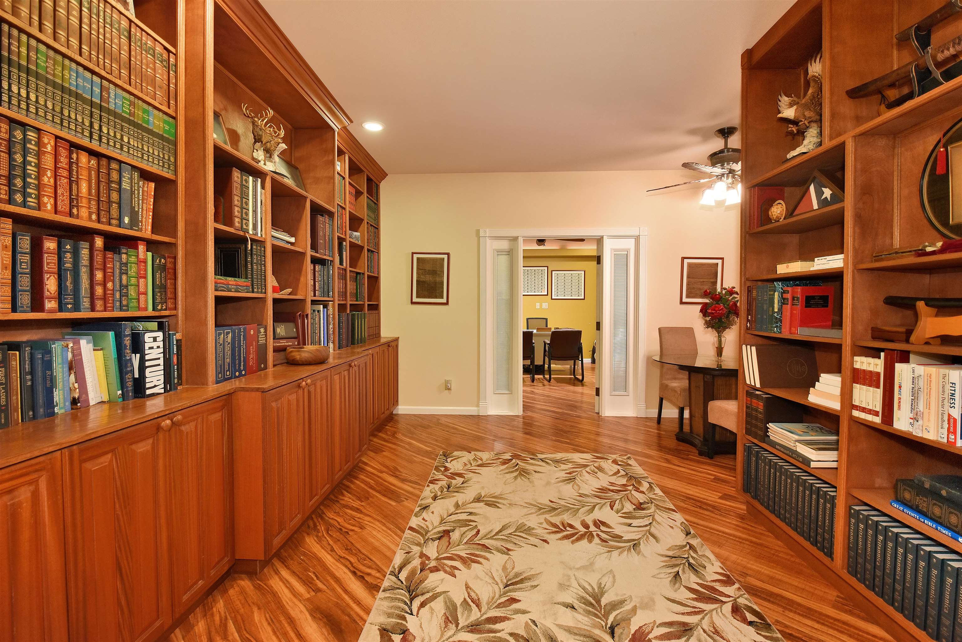 1525 Kaupakalua Road Haiku, HI 96708 - Photo 3 of 47 a view of a bedroom with furniture and book shelf