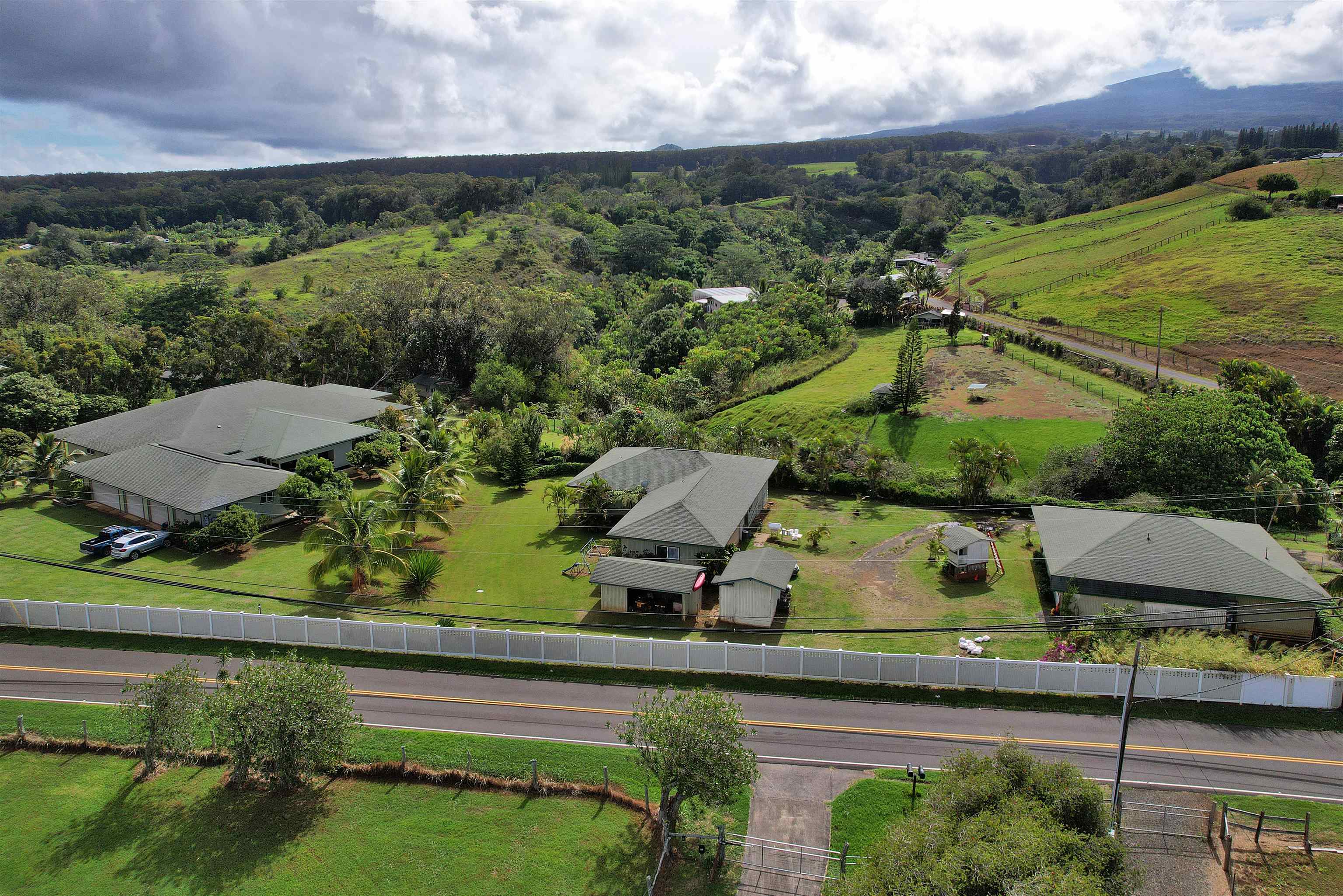 1525 Kaupakalua Road Haiku, HI 96708 - Photo 38 of 47 an aerial view of a house with a yard