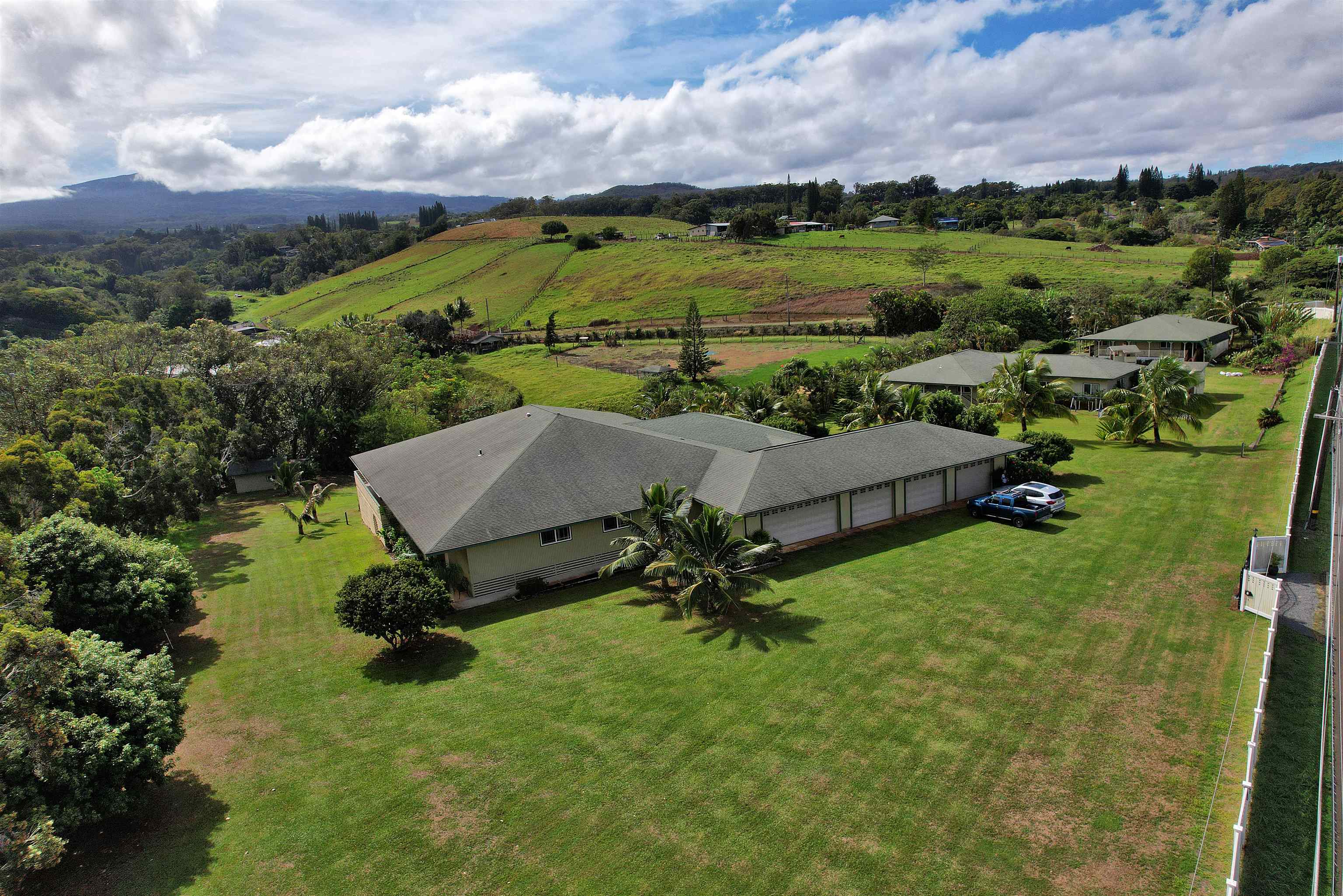 1525 Kaupakalua Road Haiku, HI 96708 - Photo 41 of 47 an aerial view of a house with a garden