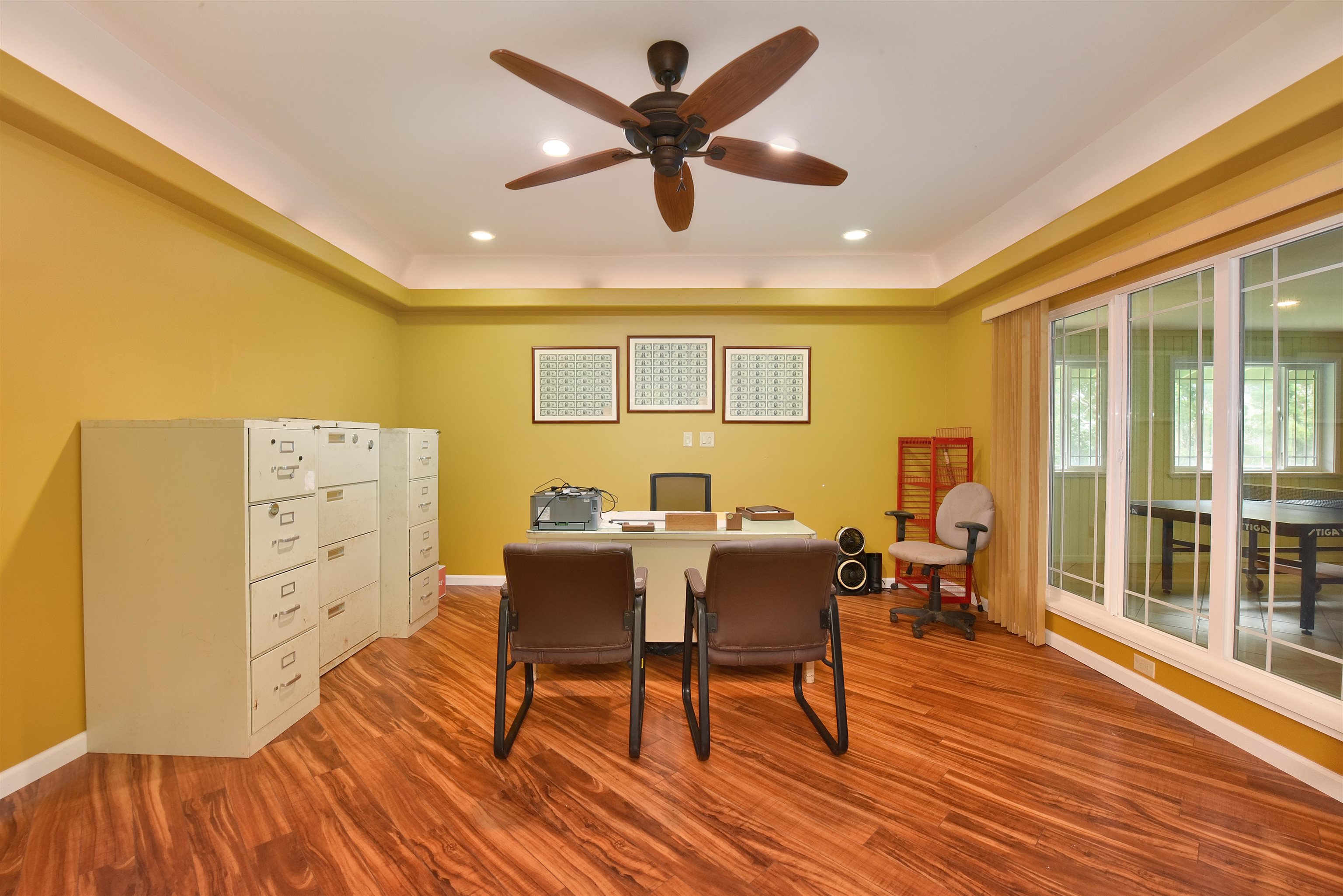 1525 Kaupakalua Road Haiku, HI 96708 - Photo 7 of 47 a view of a dining room with furniture and wooden floor