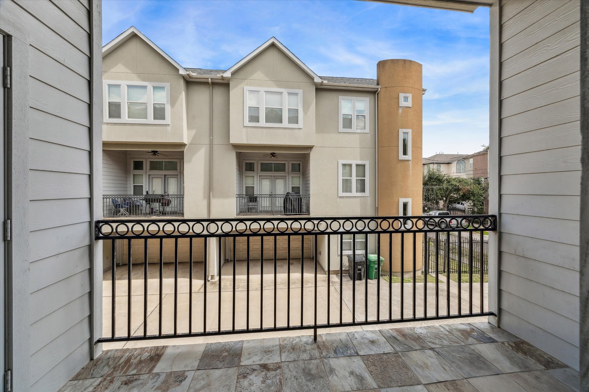 5736 Kansas Street, Unit B Houston, TX 77007 - Photo 17 of 28 a front view of a house with iron fence
