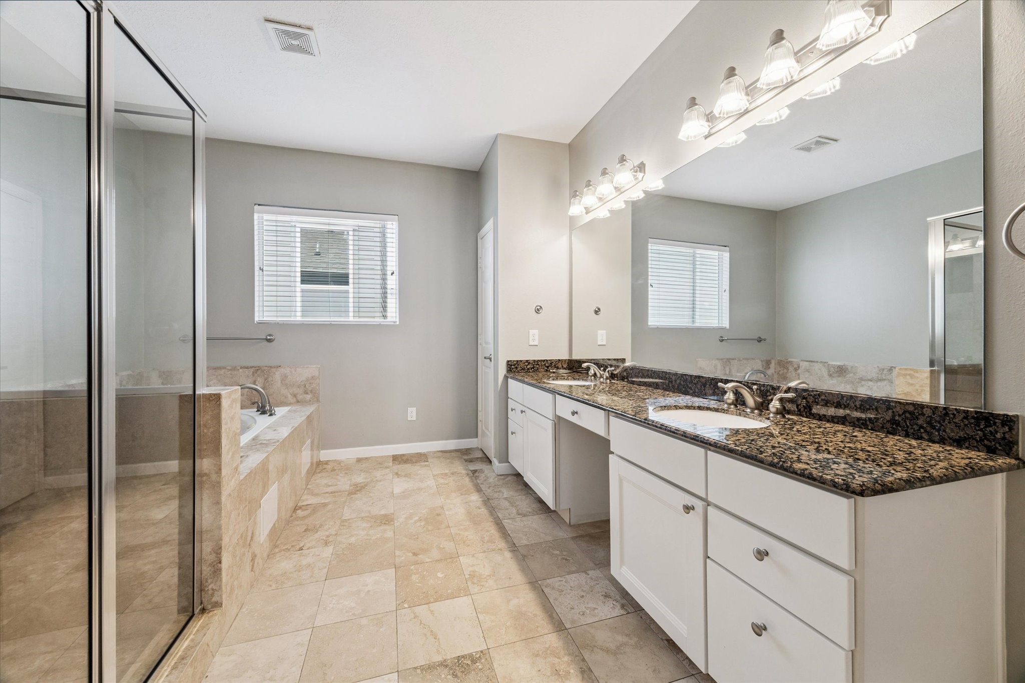 5736 Kansas Street, Unit B Houston, TX 77007 - Photo 22 of 28 a kitchen with a sink stove and refrigerator