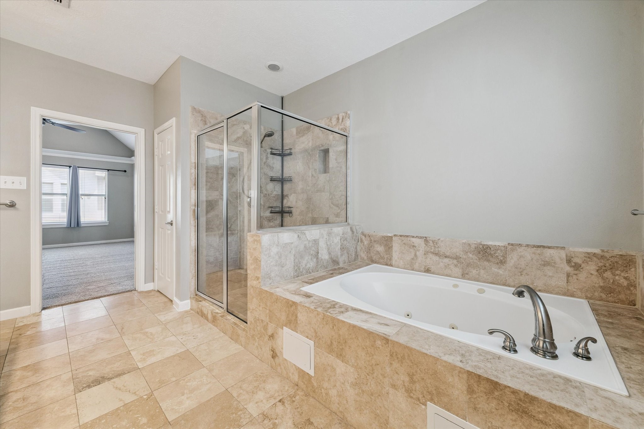 5736 Kansas Street, Unit B Houston, TX 77007 - Photo 23 of 28 a bathroom with a tub a sink and a shower