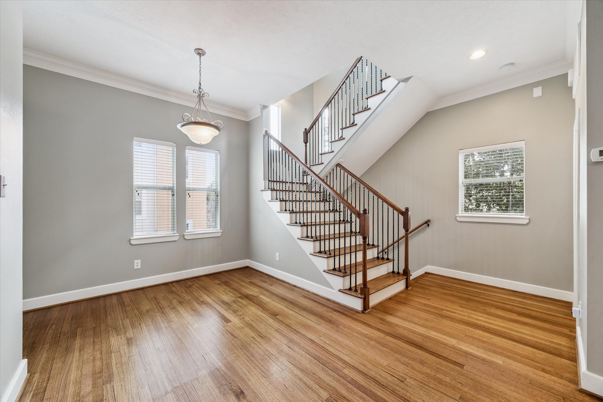 5736 Kansas Street, Unit B Houston, TX 77007 - Photo 9 of 28 a view of entryway with wooden floor and window