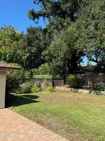 a view of swimming pool with a patio