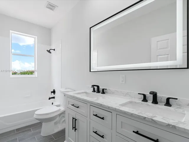 $799,000 | 6758 Lake Nona Place, Lake Worth, FL 33463