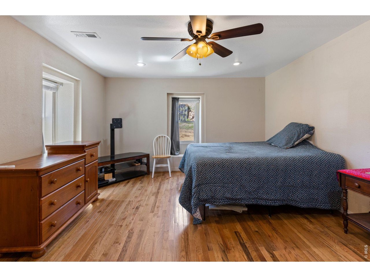 1312 Steamboat Valley Road Lyons, CO 80540 - Photo 21 of 38 Main level primary bedroom