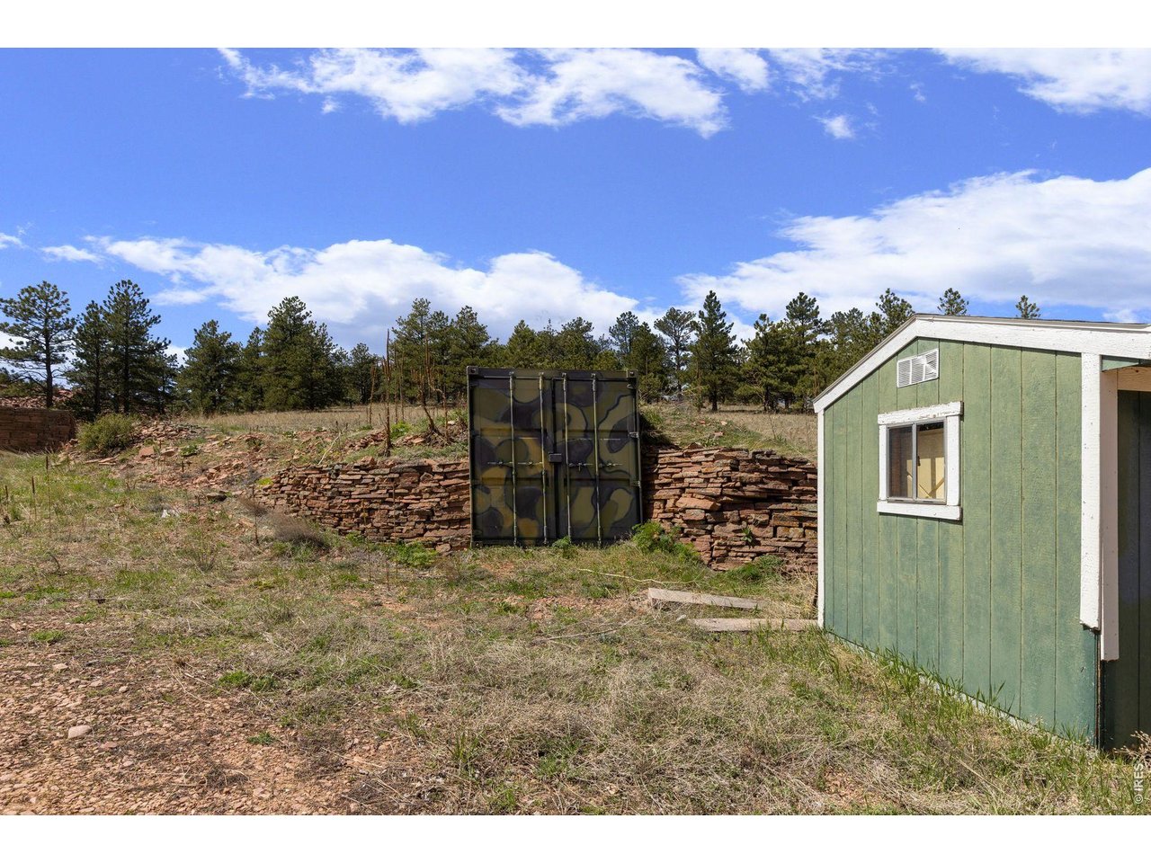 1312 Steamboat Valley Road Lyons, CO 80540 - Photo 27 of 38 Storage sheds adjacent to house