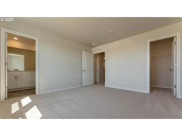 a bathroom with a sink a mirror and a shower