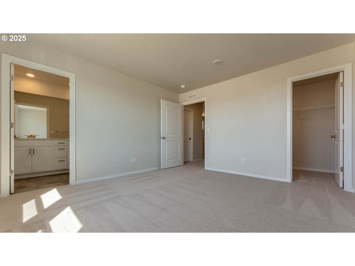 2957 U Street Springfield, OR 97477 - Photo 12 of 22 a open hall with a toilet