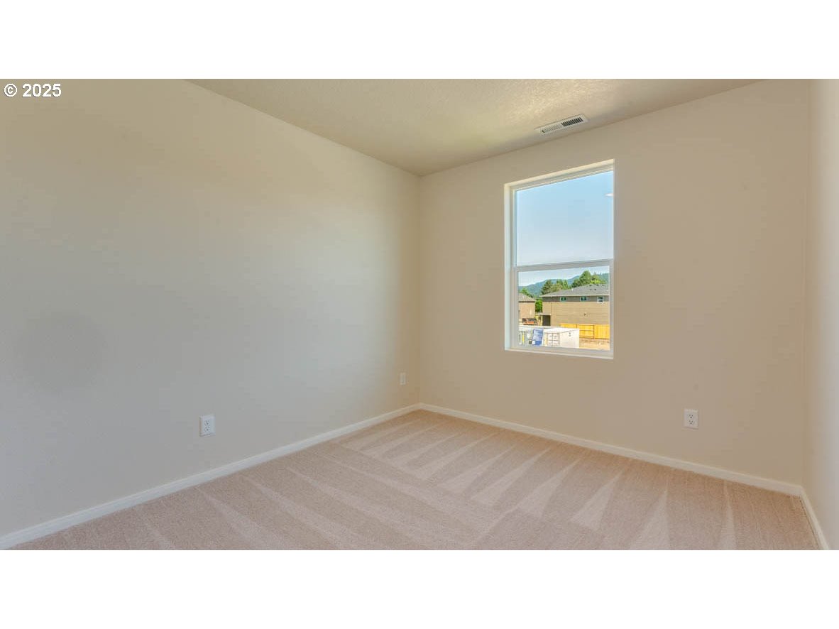 2957 U Street Springfield, OR 97477 - Photo 18 of 22 a open space with a window