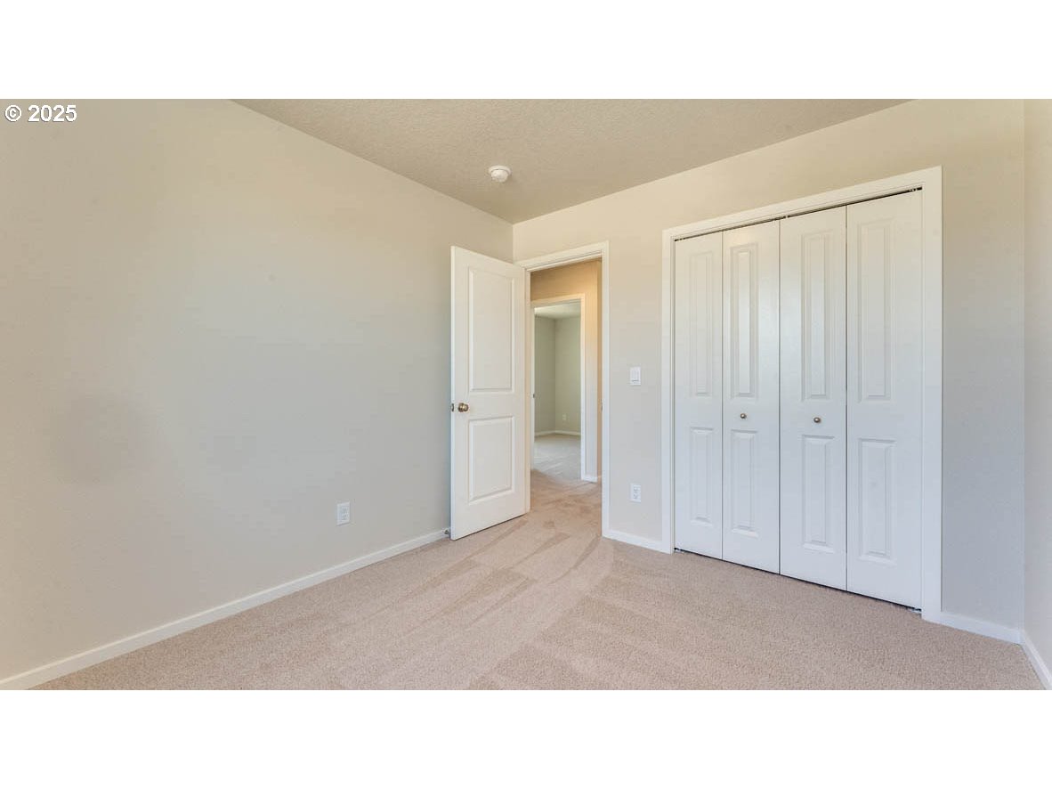 2957 U Street Springfield, OR 97477 - Photo 19 of 22 a open hall with a elevator