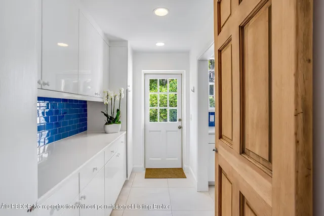 a bathroom with a tub and shower