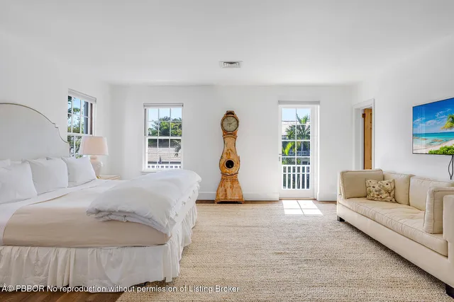 a bed room with a bed and a couch