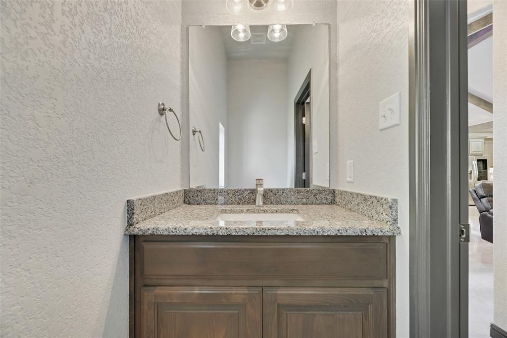 416 Christian Way Azle, TX 76020 - Photo 12 of 23 Half Bathroom with vanity