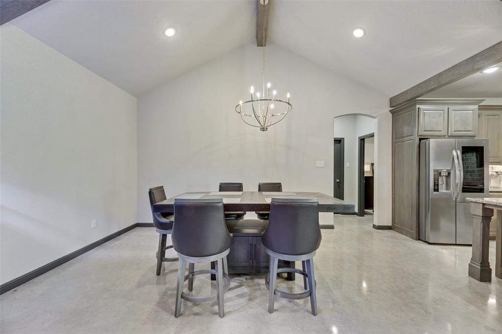 416 Christian Way Azle, TX 76020 - Photo 5 of 23 Dining space featuring beam ceiling, arched walkways, a chandelier, finished concrete floors, and recessed lighting
