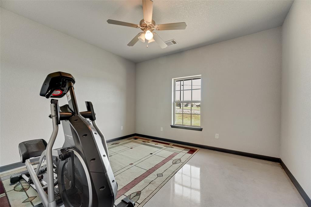 416 Christian Way Azle, TX 76020 - Photo 10 of 23 Bedroom #2 with ceiling fan and a textured ceiling