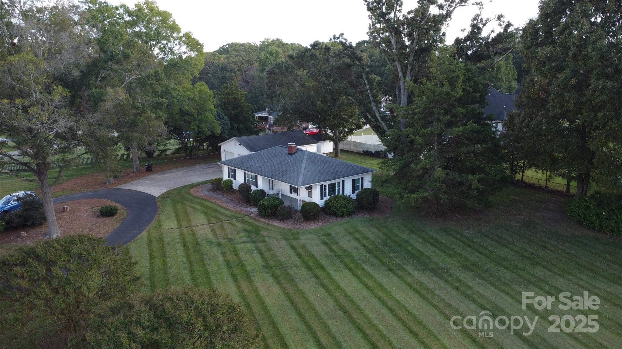 an aerial view of a house having yard