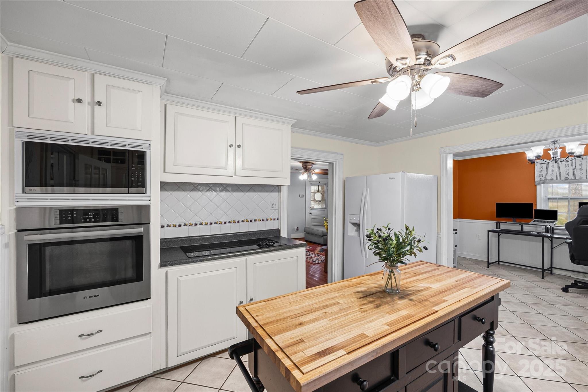 110 Glover Road Gastonia, NC 28056 - Photo 11 of 30 a kitchen with a stove a microwave and a table