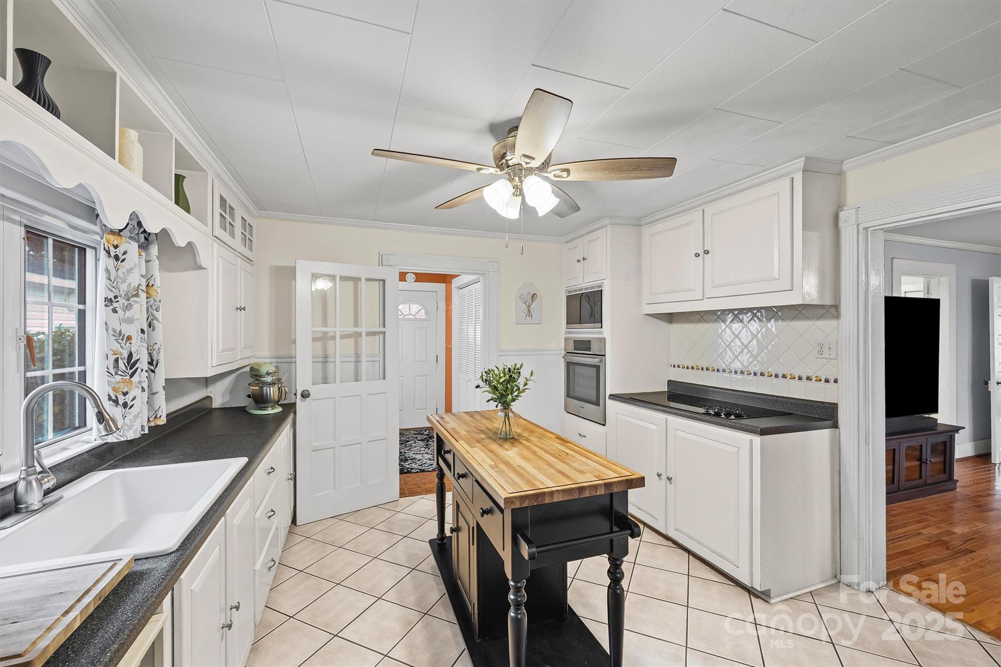 110 Glover Road Gastonia, NC 28056 - Photo 12 of 30 a kitchen with granite countertop a stove a sink and a refrigerator