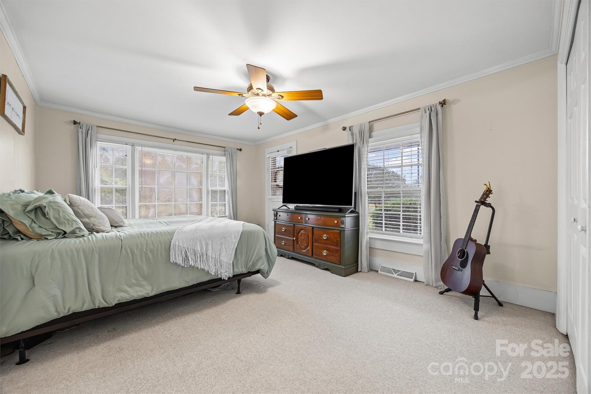 110 Glover Road Gastonia, NC 28056 - Photo 15 of 30 a living room with furniture a flat screen tv and a window