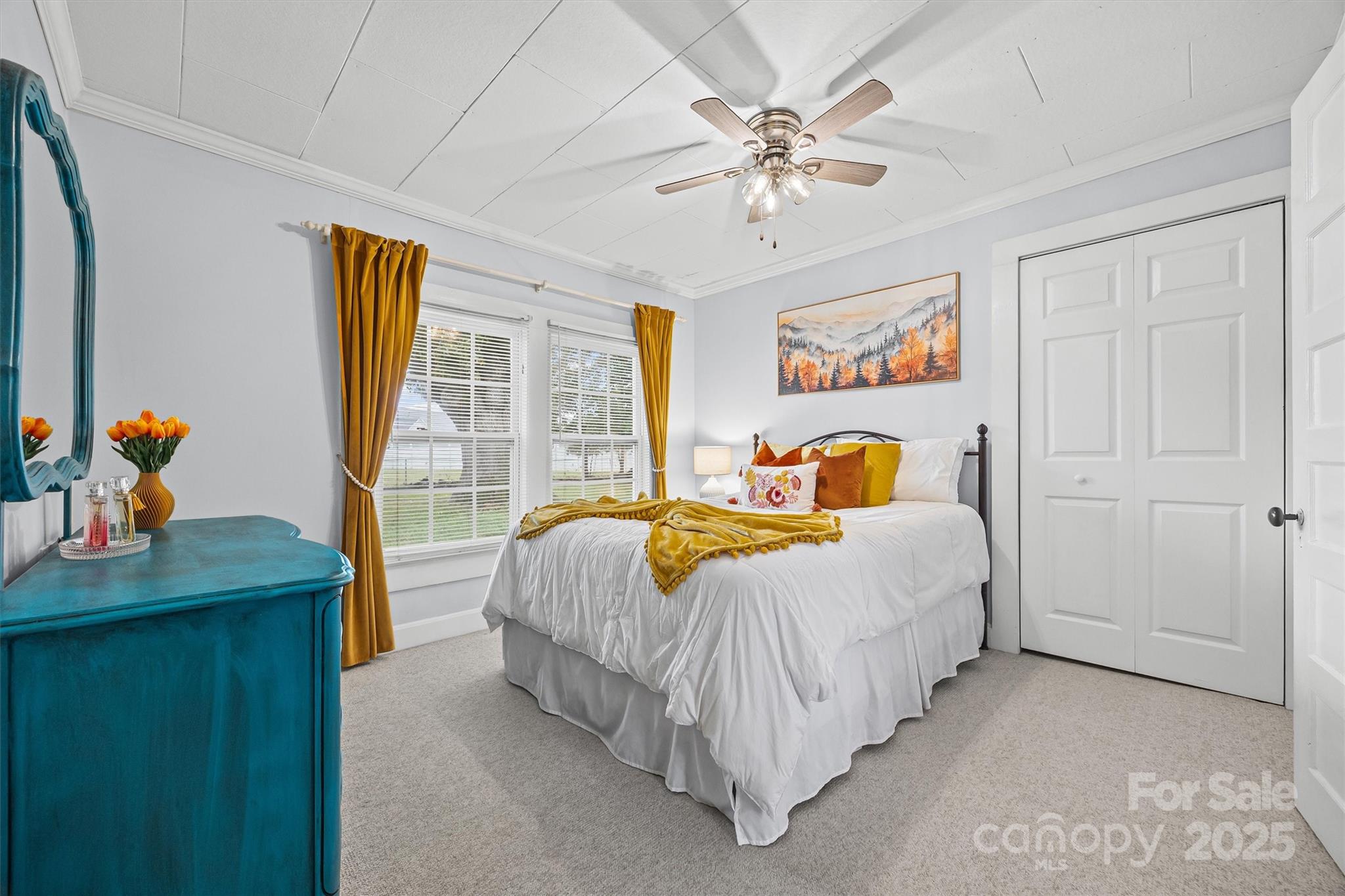 110 Glover Road Gastonia, NC 28056 - Photo 20 of 30 a bedroom with a bed and a chandelier