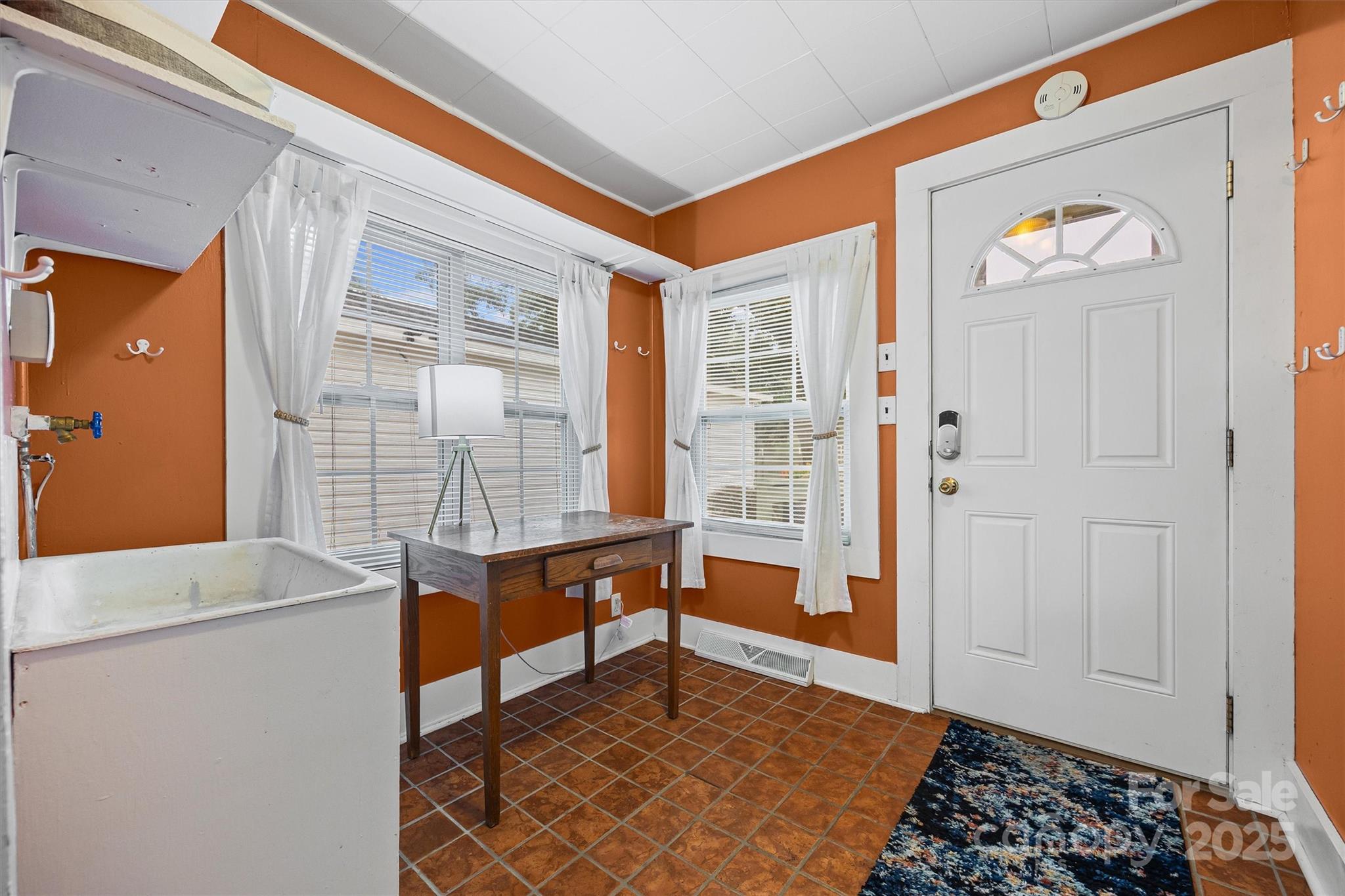 110 Glover Road Gastonia, NC 28056 - Photo 23 of 30 a view of room with window and couch