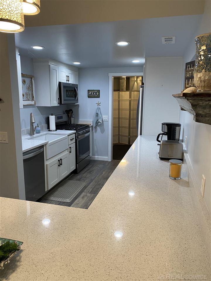 8953 Lakeshore Road Lexington, MI 48450 - Photo 15 of 24 Customized Kitchen (8x11) - Laminate Floor with Quartz Countertop