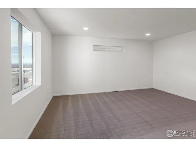 a bathroom with a sink toilet vanity and tub