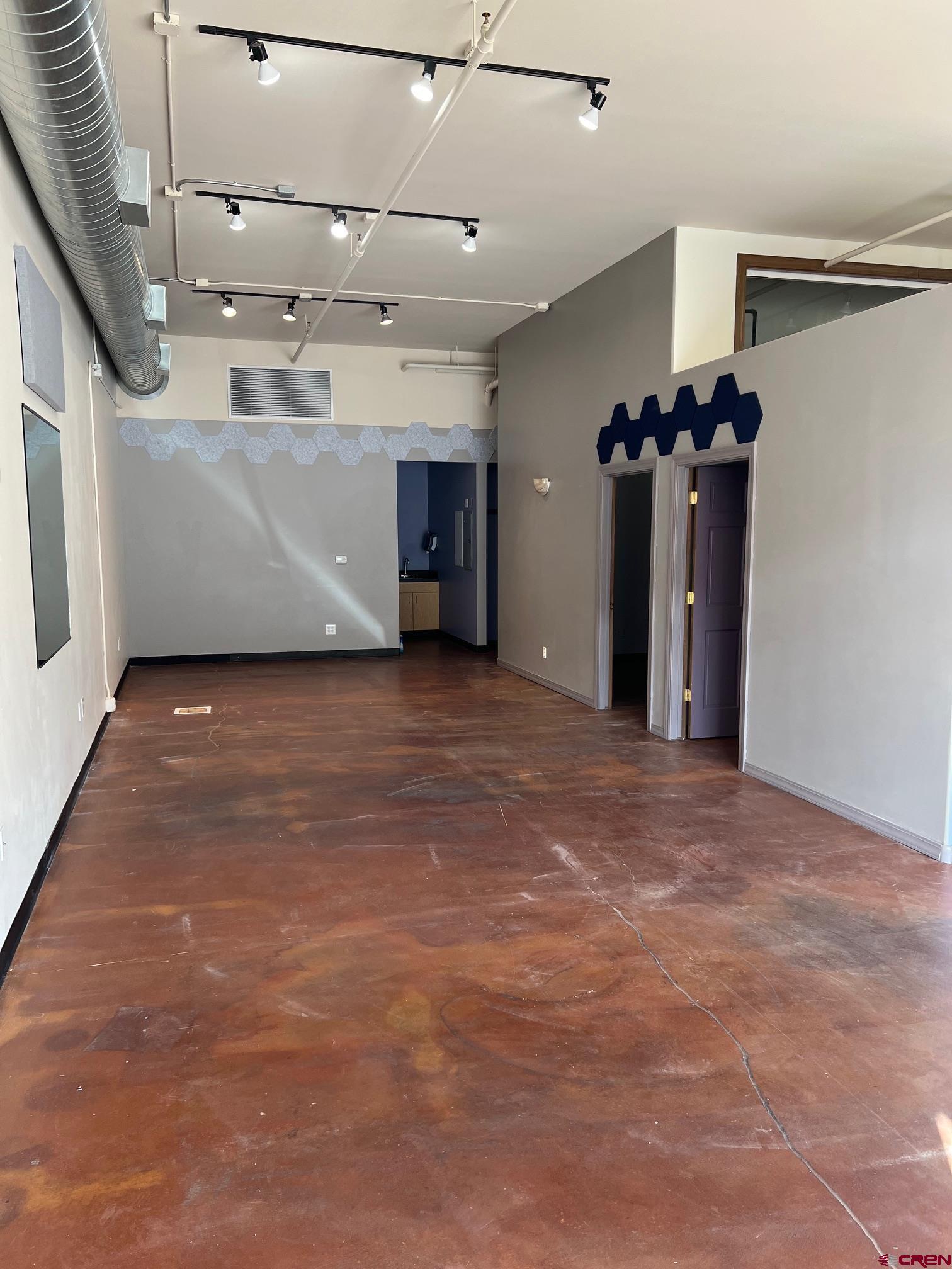 555 Rivergate Lane, Unit 108 Durango, CO 81301 - Photo 12 of 12 a view of a livingroom with a staircase