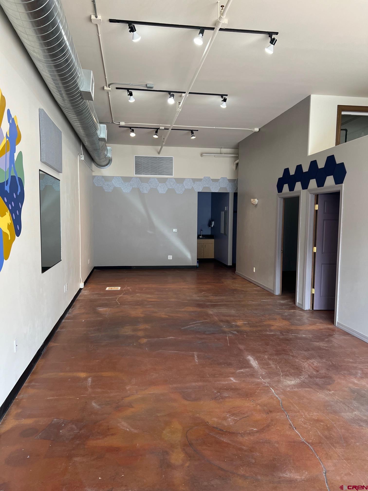 555 Rivergate Lane, Unit 108 Durango, CO 81301 - Photo 2 of 12 a view of a livingroom with a furniture