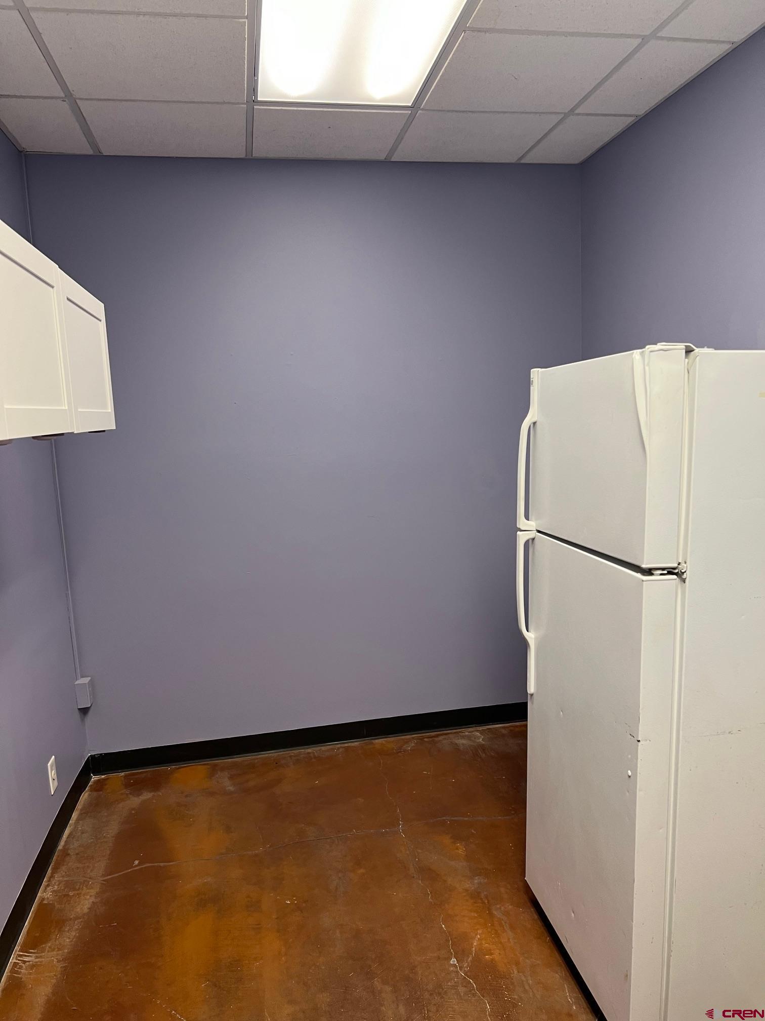 555 Rivergate Lane, Unit 108 Durango, CO 81301 - Photo 6 of 12 a view of a refrigerator in a kitchen