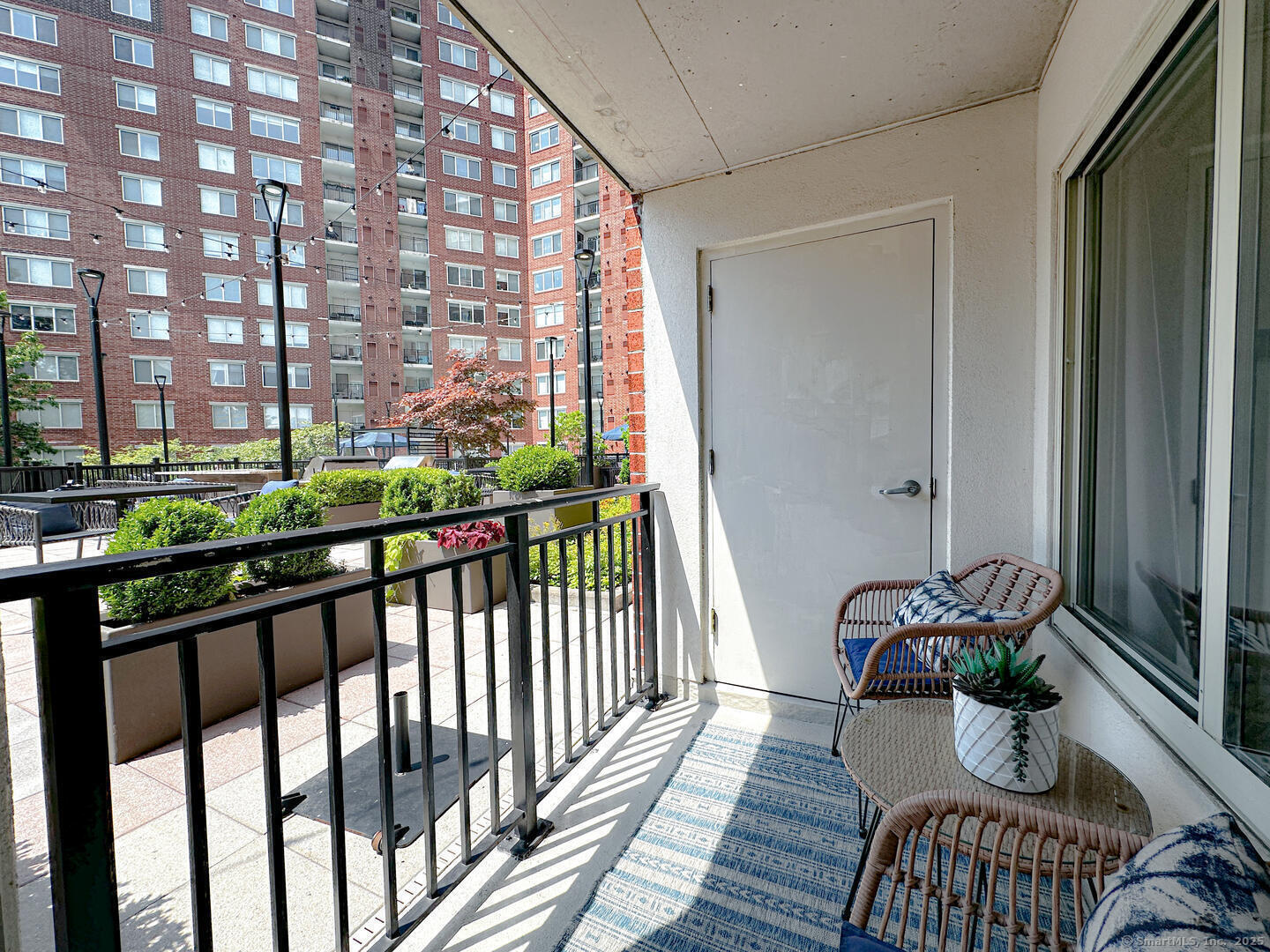 52 Forest Street, Unit 1402 Stamford, CT 06901 - Photo 17 of 23 a view of balcony with a potted plant