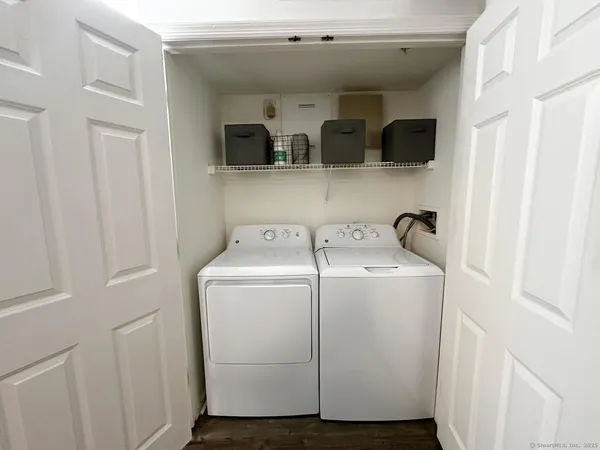 a utility room with dryer and washer