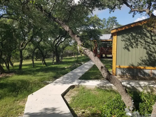a view of a pathway with outside space