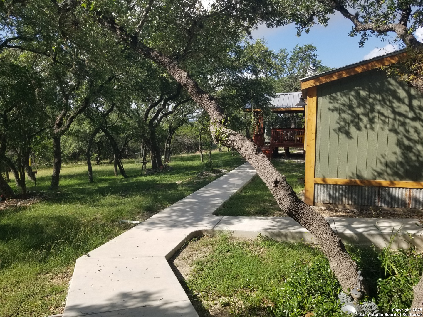177 Laurel Ridge Drive Lakehills, TX 78063 - Photo 13 of 51 a view of a park with large trees