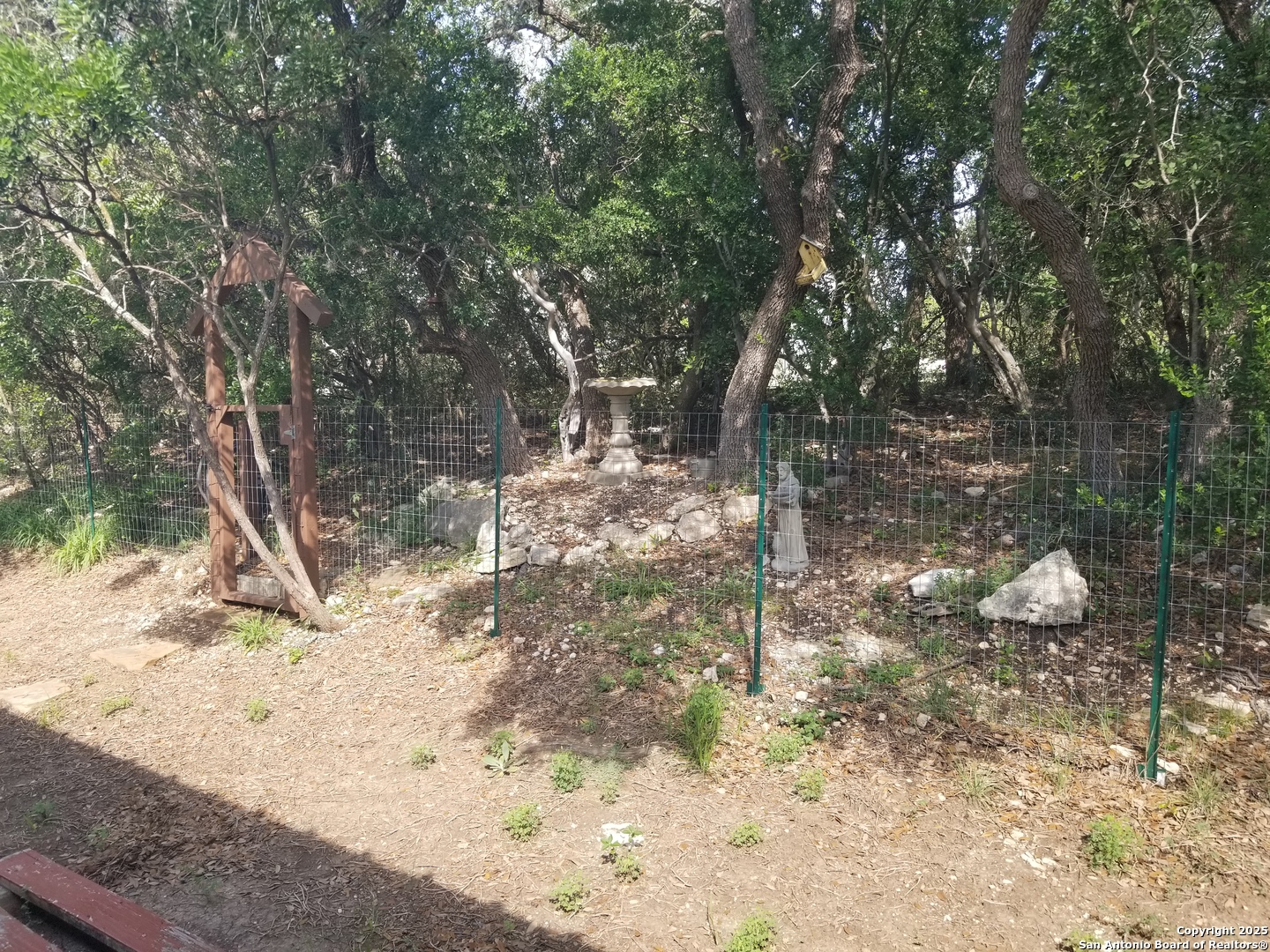 177 Laurel Ridge Drive Lakehills, TX 78063 - Photo 18 of 51 a view of a yard with trees