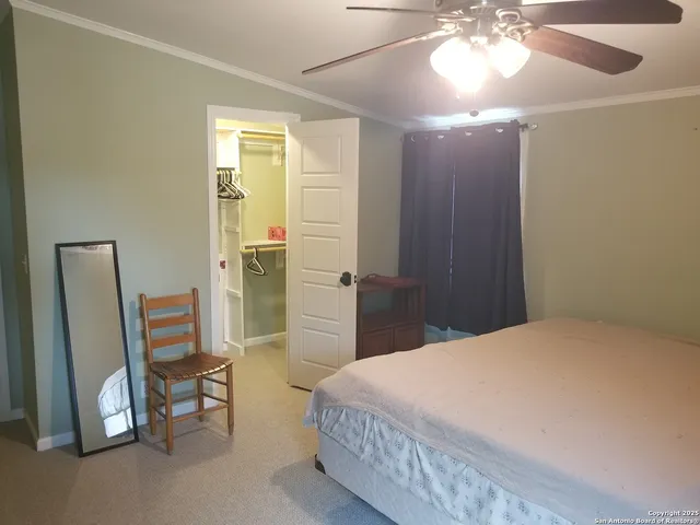 a white bath tub sitting in a bathroom