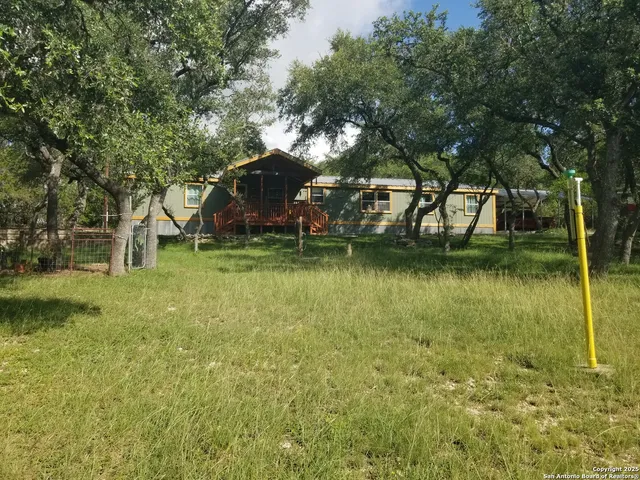 a view of a lake with a building in the background