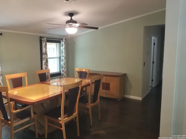 a kitchen with stainless steel appliances a sink stove refrigerator and cabinets
