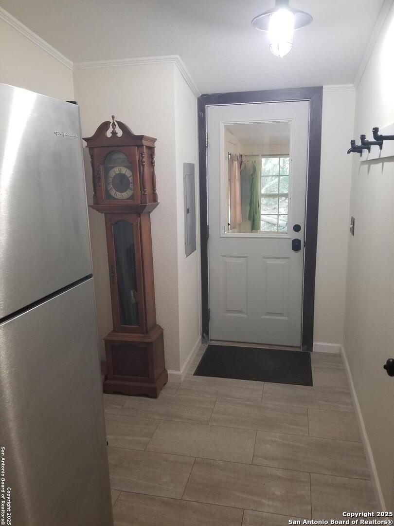 177 Laurel Ridge Drive Lakehills, TX 78063 - Photo 40 of 51 a view of a hallway with washer and dryer