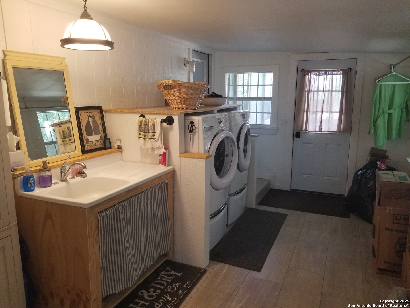 177 Laurel Ridge Drive Lakehills, TX 78063 - Photo 47 of 51 a utility room with dryer and washer