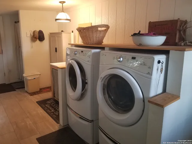 a view of swimming pool is middle in the middle of a yard