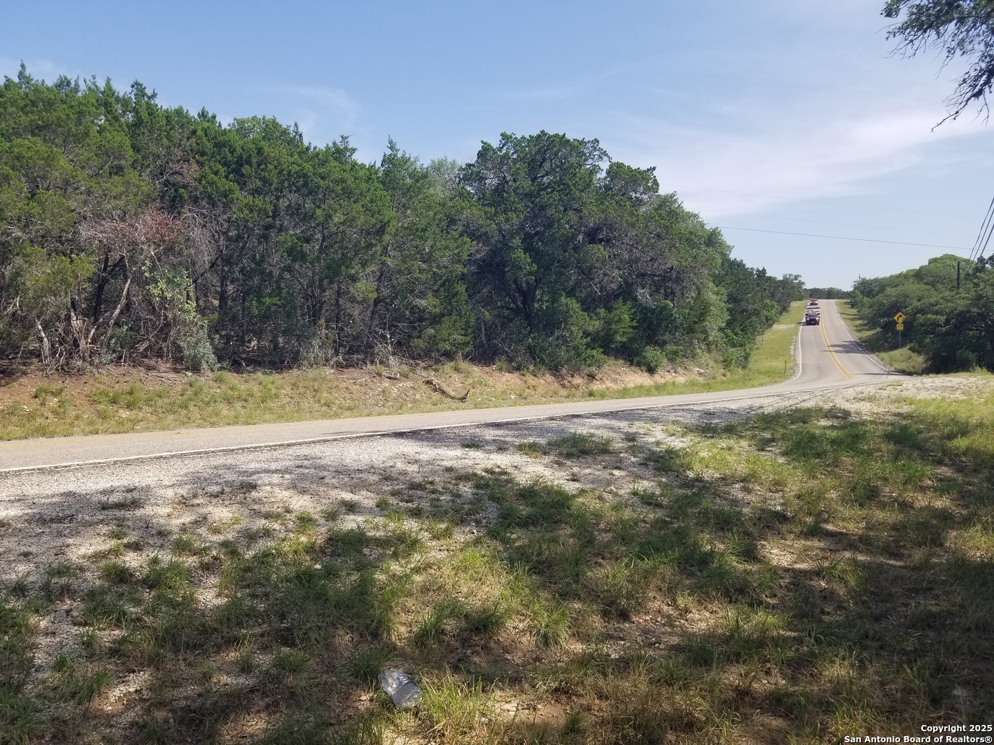 177 Laurel Ridge Drive Lakehills, TX 78063 - Photo 51 of 51 a view of a yard with mountain view